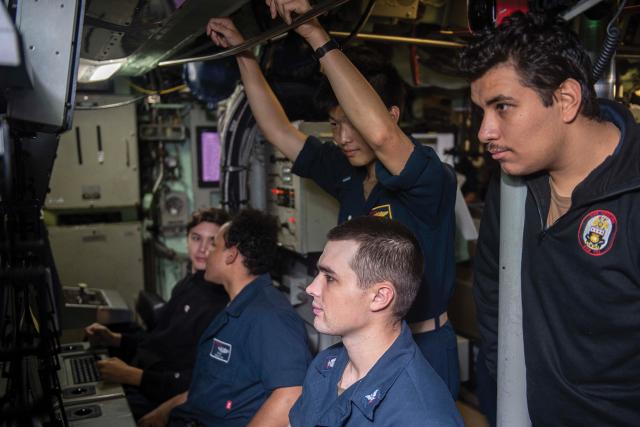 A submarine watch team leader must build trust with both the command triad and his or her sailors.