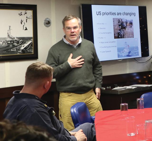 Dr. Erik Gartzke, chair of the Center for Peace and Security Studies at the University of California, San Diego, discusses Middle East geopolitics and information’s role in warfare with the USS Paul Hamilton’s wardroom.