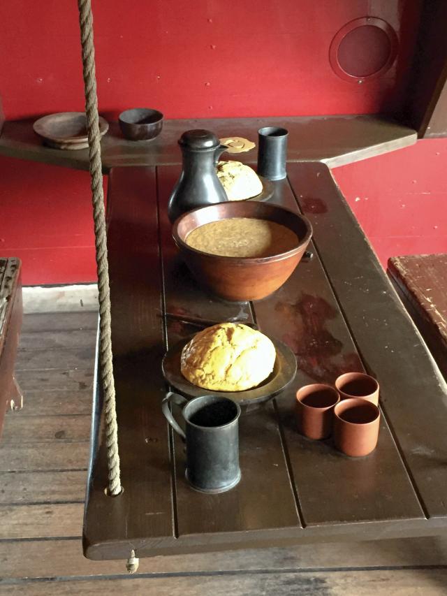 Replica food on a table on board the replica Dutch East Indiaman Amsterdam