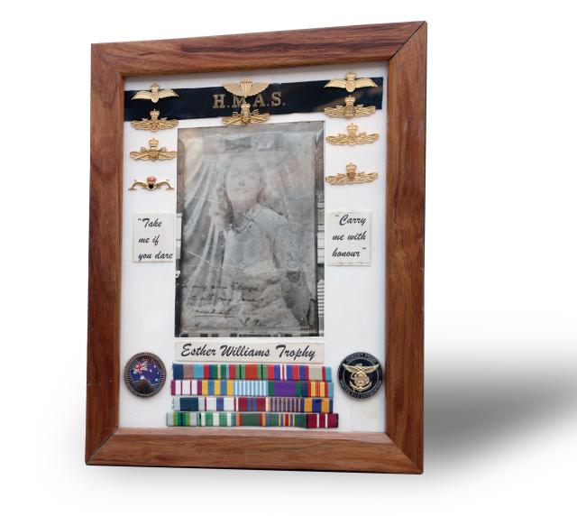 An Australian lieutenant’s “autographed” studio photo of famous swimmer and actress Esther Williams evolved into a tradition among various ships’ wardrooms in which her “honor” required “rescue” from the particular wardroom that hosted the trophy. 