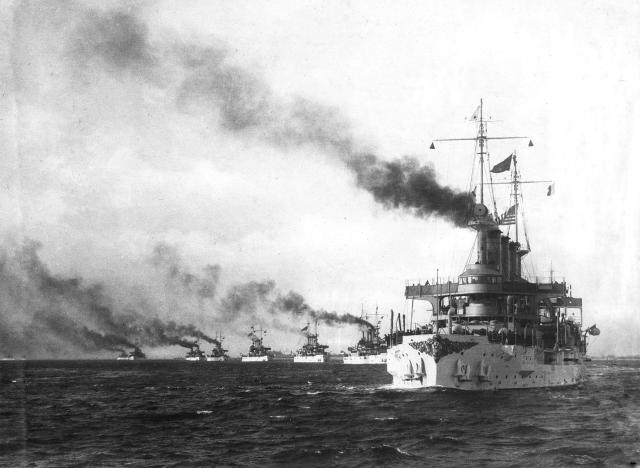 The USS Connecticut (BB-18), Georgia (BB-15), and other battleships of the Great White Fleet, shortly after getting under way at Hampton Roads, the flagship Connecticut leading, flying the flag of Rear Admiral Robley D. Evans. U.S. Naval Institute Photo Archive.