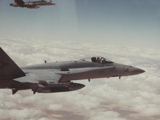 Desert Storm, Day One: Lieutenant Commander Mark Fox flies an F/A-18 Hornet off the Saratoga; on this initial sortie, he and Lieutenant Nick Mongillo would down two MiG-21 fighters over Iraq.