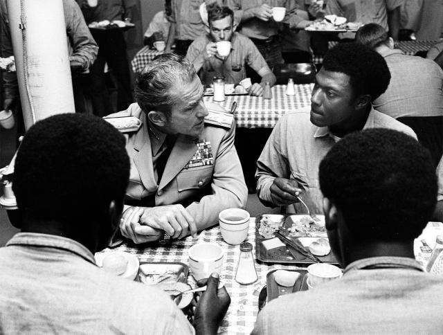 Admiral Zumwalt talks with sailors on the mess deck of the USS Puget Sound (AD-38) in 1970. Zumwalt preferred to take his message directly to his sailors, bypassing the chain of command, alienating flag officers, and lessening his overall impact on Navy policy. 