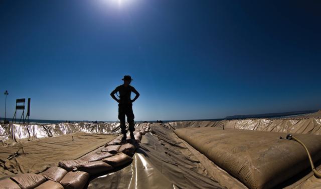 Bulk fuel is the lifeblood of modern military operations. But stored in giant bladders, such as these set up at Camp Pendleton, California, they are a significant vulnerability. The Marine Corps needs new fuels with higher energy densities, lower risk of detection, and easier transportability.