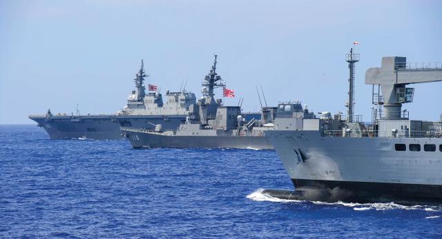 ships from the Indian Navy and Japan Maritime Self-Defense Force participate in Malabar, a trilateral exercise 
