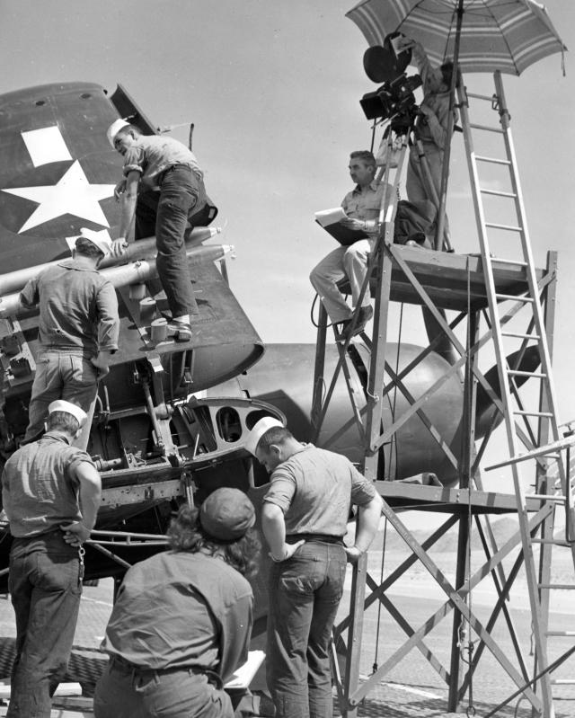 A Navy film crew sets up a shot, Hollywood-style, during World War II.