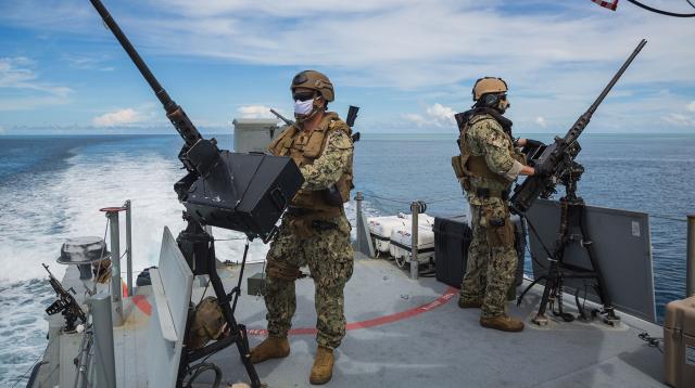 Sailors at weapons stations on Mk VI