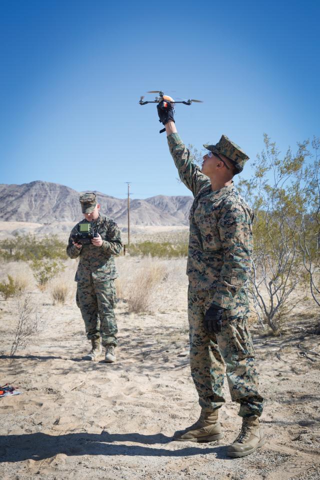 Marines conduct start-up drills for the InstandEye Quadcopter during a Quad for Squads training event 