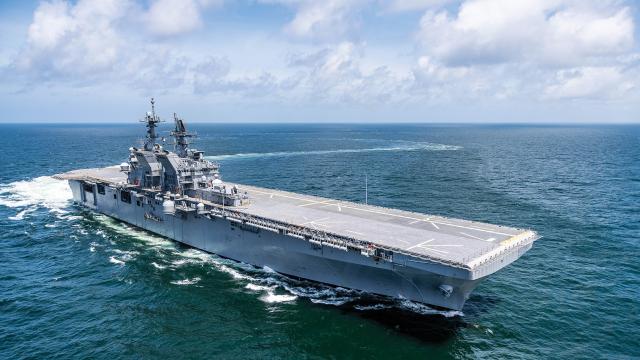 The USS Tripoli (LHA-7), seen during sea trials in 2018, was commissioned without public ceremony on 15 July.