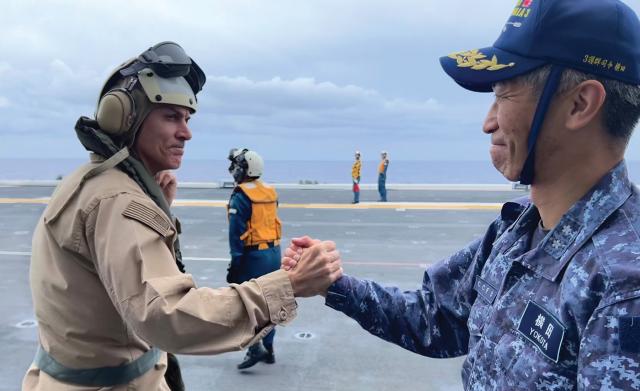 The commanders of the U.S. Navy’s Carrier Strike Group 5 and the Japan Maritime Self-Defense Force’s Escort Flotilla 3, before the former departs the helicopter destroyer Izumo on 6 June 2024 in advance of Valiant Shield 2024. The tenth biennial Valiant Shield exercise drew the participation of HMCS Montreal, France’s Bretagne, and a Japan Maritime Self-Defense Force contingent that included eight ships, 4,000 personnel, 130 vehicles, and 60 aircraft.