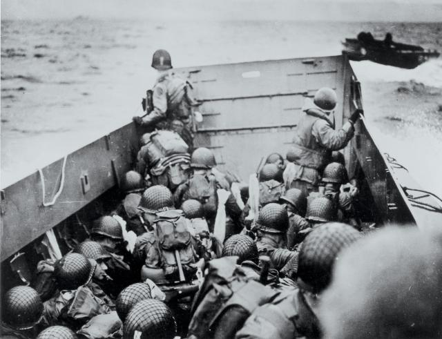 D-Day, 6 June 1944: Troops crouch inside an LCVP just before landing on Omaha Beach. The invasion of Normandy was “the single most decisive naval event of World War II.”