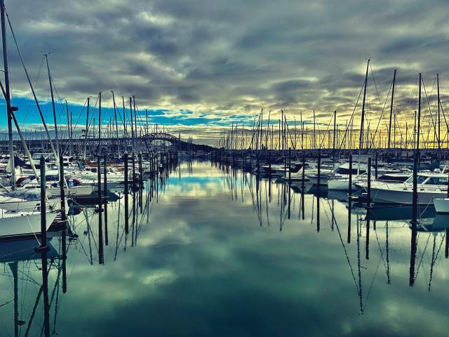 Mirrored Dinghies LCDR Sarah Kuehl, USNR A beautiful marina in Auckland, New Zealand, May 2023.