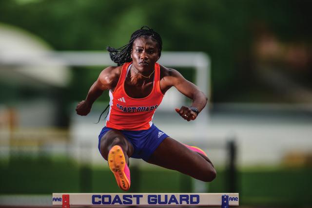 Clearing Hurdles David Lau  U.S. Coast Guard Academy cadet Michelle Kwafo broke two Academy records in two individual events and one relay, May 2023.