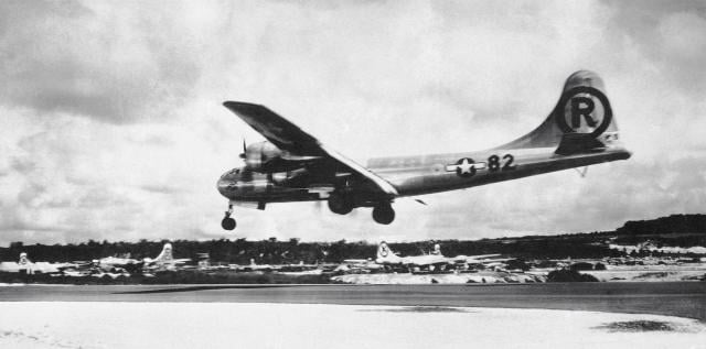 The Enola Gay landing after the atomic bombing mission on Hiroshima, Japan, helping to end the greatest conflict in history but ushering in a new era of war. 