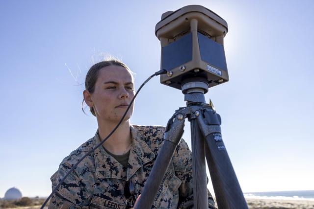 U.S. Marine Corps Lance Cpl. Nicole Leeds, an aviation meteorological equipment technician with 1st Intelligence Battalion, I Marine Expeditionary Force Information Group, inspects an Advanced Micro Weather System during weather data collection at Marine Corps Base Camp Pendleton, California.