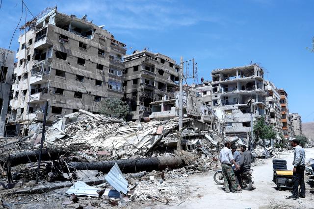 The U.S. declaration of a “redline” if Syrian President Bashar Assad used chemical weapons against his own people did not deter their use, such as at this site of a suspected chemical attack near Damascus. The Syrian regime did not believe the U.S. redline credible.