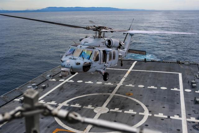Part of an LCS’s offensive capability comes from the aviation detachment’s MH-60S Seahawk helicopter. When deployed together, the radar warning coverage area of two helicopters increases the probability of detecting the enemy, and defensive maneuvering with two helicopters complicates enemy targeting solutions.