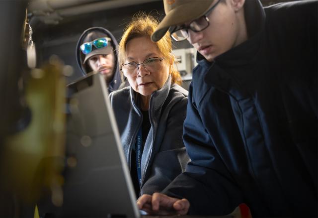When new systems or system upgrades  become available, Navy ships should be able to incorporate them quickly. Here, Navy sailors and civilians update software on board the USS Santa Barbara (LCS-32) 
