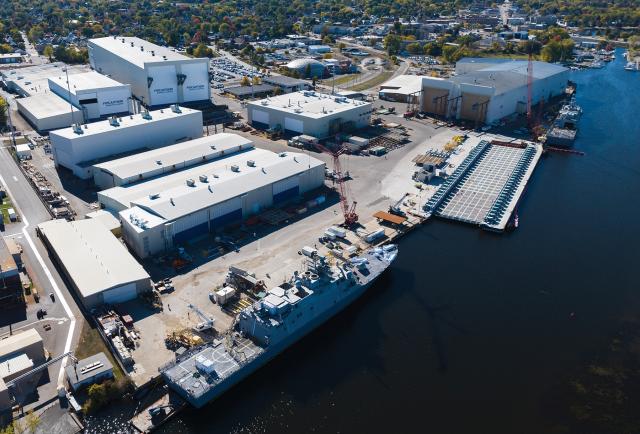 Fincantieri Marinette Marine in Wisconsin has made several upgrades to its facility in recent years to aid production of the Navy’s new Constellation-class frigate. Among these improvements are a new ship lift (above) that slowly lowers ships into the water instead of sliding them down an incline, and an automated panel line (right) that prepares, marks, cuts, and welds steel plates.
