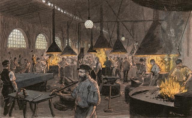 The bustling scene inside a workshop at the great German shipbuilding city of Kiel, circa 1900.