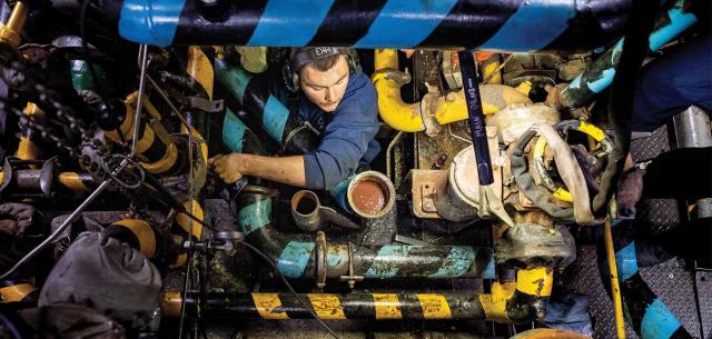 A machinery technician removes a broken jacket water pump on the USCGC Polar Star (WAGB-10) in the Southern Ocean in December 2022 following a pump failure. After the cutter left dry dock in 2023, a lube oil heater on an engine caught fire after its flow switch stuck closed. A watchstander put out the fire, but something not considered worth monitoring might have destroyed the only heavy U.S. icebreaker.