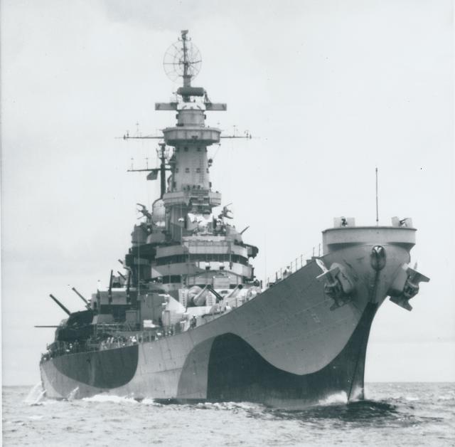 A starboard bow view of the Missouri showing her Atlantic Ocean dazzle-pattern camouflage.