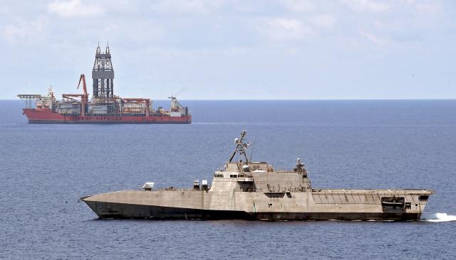 The USS Gabrielle Giffords (LCS-10) conducts routine operations near the Panamanian-flagged drillship, West Capella. The LCS’s armament centered on rapid-firing guns—effective in close-quarters engagements—and offensive antiship missiles makes it a good candidate to defend freedom of the seas in the first island chain.