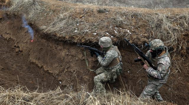 Ukrainian service members take position in a trench during a military training exercise. Instead of a high-tech, advanced-weapons fight, the war in Ukraine has been characterized by urban warfare, combined-arms assaults, and World War I–era trench warfare. The Marine Corps should heed this lesson and embrace more sustainable and survivable solutions in the field. 