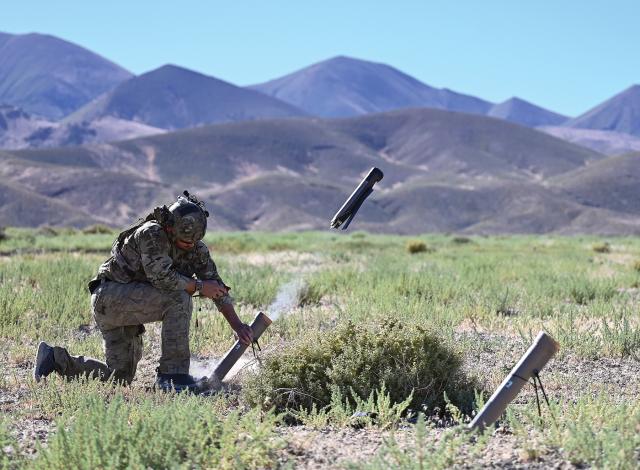 A Marine launches a Switchblade loitering munition during an exercise. With a range of approximately 15 miles, the Switchblade has been highly effective against Russian ground forces in the war in Ukraine. Drones of this size, range, and payload will be less decisive in naval combat inside the first island chain. 