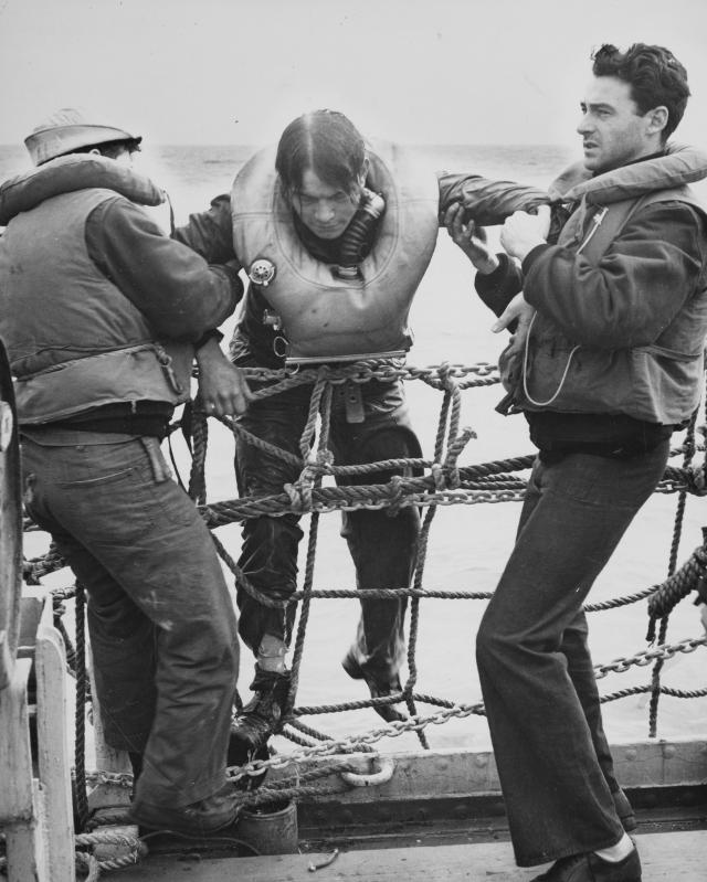 German submariner is pulled aboard 
