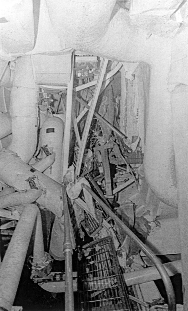 Damaged engine room of the USS Samuel B. Roberts (FFG-58) after the ship struck a mine