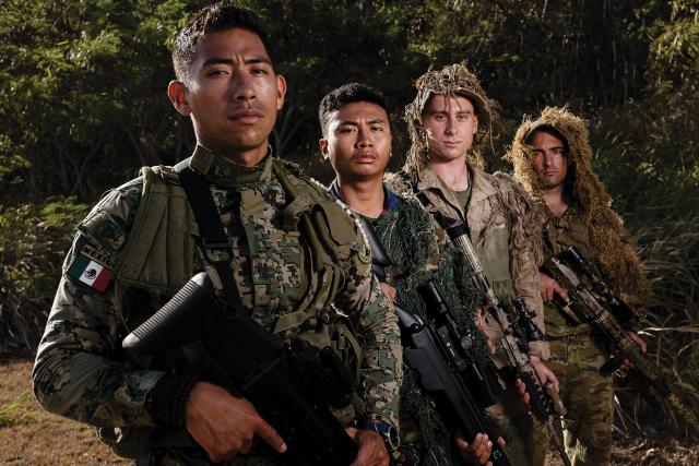 From left to right, snipers from the Mexican Naval Infantry Corps, Indonesian Korps Marinir, U.S. Marine Corps, and Australian Army pose for a photo during Rim of the Pacific 2022. Twenty-six nations, 38 ships, 4 submarines, more than 170 aircraft, and 25,000 personnel participated in the exercise, held between 29 June and 4 August.