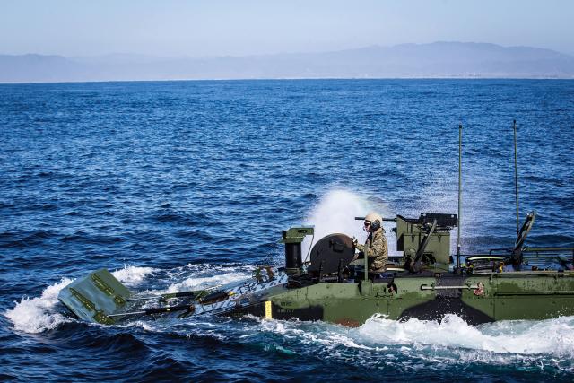 Tests of the Amphibious Combat Vehicle (ACV, shown) proved successful enough that the Marine Corps condensed plans for ACV 1.1 and 1.2 into a single first model. The wheeled, armored troop carrier is to replace the Corps’ aging Amphibious Assault Vehicles.