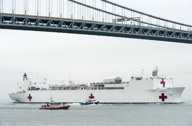 Navy hospital ship Comfort enters New York harbor on 30 March 2020. 
