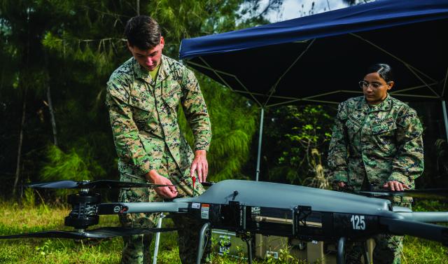 Unmanned aerial logistics systems can help sustain distributed forces, but small systems such as the Tactical Resupply Unmanned Aircraft System (TRUAS), shown here during an exercise in Okinawa, are capable of moving only 150 or so pounds less than 10 miles.