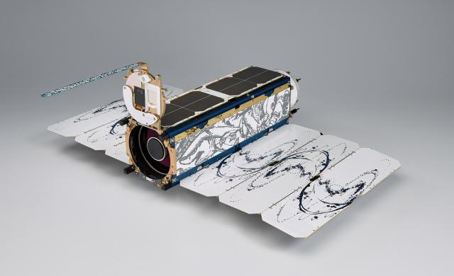The combination of smallsats weighing only a few pounds, such as this Dove satellite from Planet Labs,  and excess launch capacity on commercial boosters has revolutionized the economics of satellite imagery. 