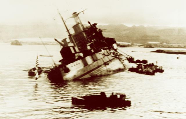The Utah listing after the Pearl Harbor raid. Japanese air crews had expended precious firepower on the non-target.