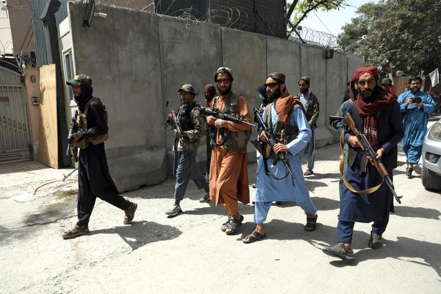 Taliban fighters patrol the streets of Kabul