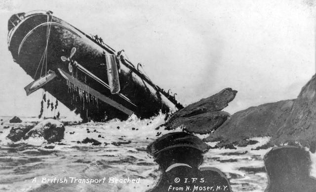 View of a sinking British transport ship with its stern in the air.