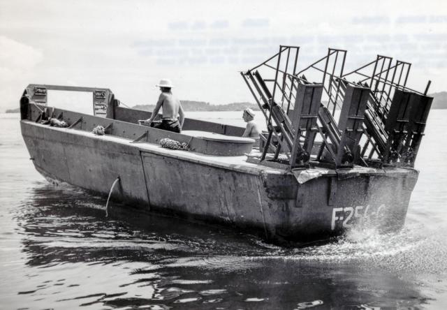 Armed with rocket launchers, a U.S. Navy LCVP-R moves off shore in the Solomon Islands.
