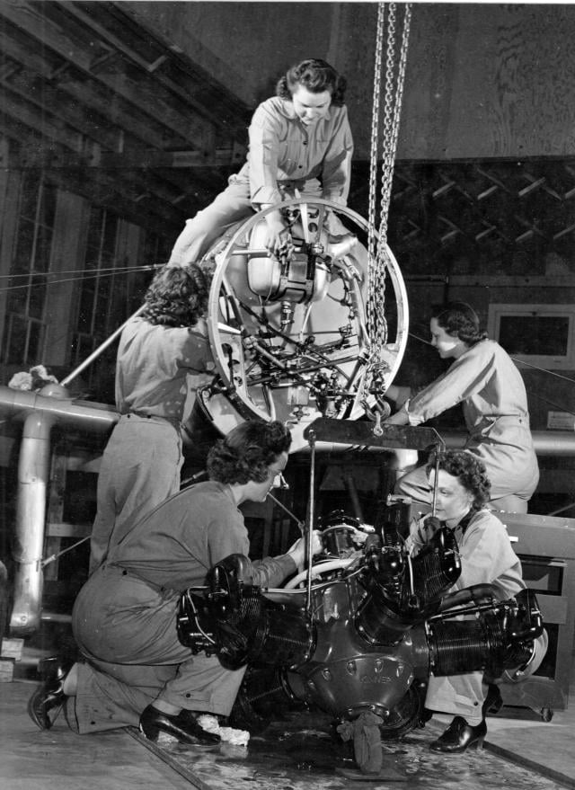 Women Accepted for Volunteer Emergency Service (WAVES) learning to repair and maintain Navy fighter plane engines at Naval Air Technical Training Center, NAS Norman, Oklahoma. October 1943.