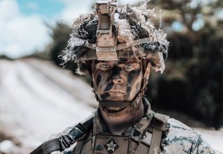A Marine assigned to 3d Marine Division under the unit deployment program during live-fire maneuver drills on Camp Schwab, Okinawa, Japan.