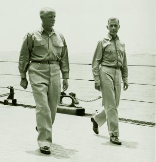 Throughout the war, Admiral Nimitz provided overarching guidance and let his subordinates do the detailed planning. Here, Nimitz (left) walks the deck of the USS New Jersey (BB-62) with Admiral Raymond Spruance, Commander Fifth Fleet, in April 1944. 