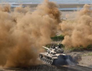 A Taiwan Army tank maneuvers to defend the shore against Chinese PLA forces. In the scenario, China has seized Taiwan’s offshore islands and the southwest portion of the main island. 