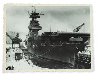 The USS Yorktown (CV-5) undergoing repairs at Pear Harbor Naval Shipyard in 1942. It was estimated her repairs would take 90 days to complete, but, knowing she was vital to the fight, Admiral Chester Nimitz gave the maintenance team 72 hours to get the Yorktown seaworthy and battle ready—a challenge it met.
