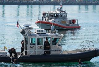 The Coast Guard and several law enforcement partners hold a full-scale emergency response exercise in the Port of Los Angeles–Long Beach. The Coast Guard wields authorities for both homeland security and defense, but wartime threats to the homeland will require tighter interagency/private industry partnerships configured for Maritime Transportation System physical and cyber security.