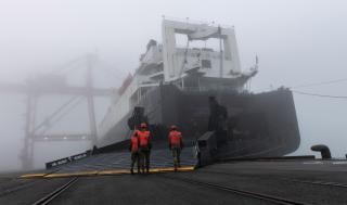 U.S. Marines with Marine Aviation Logistics Squadron (MALS) 36  embark the USNS Dahl (T-AKR-312).