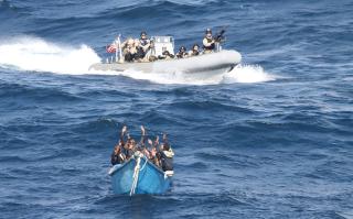 A visit, board, search, and seizure team from the USS Pinckney (DDG-91)