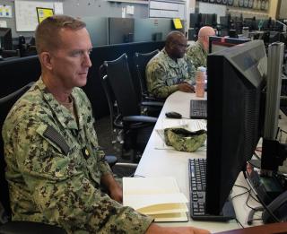An analyst reviews information during a maritime operations center (MOC) exercise. The purpose of the MOC is to synchronize maritime actions across the entire theater at the operational level, but Navy MOC doctrine and the maritime operational–level C2 structure never mention undersea warfare. 