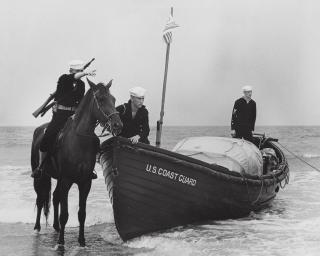 World War II–era land and sea beach patrols keep vigil for spies and saboteurs.